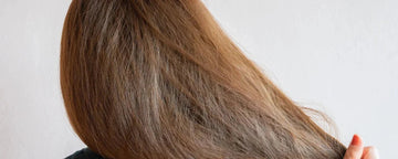 Kvinna med tjockt hår