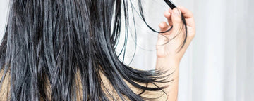 Kvinna med fett hår