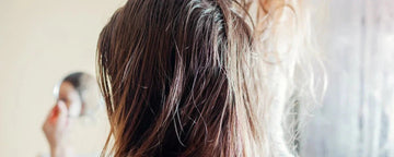 Kvinna med fett hår