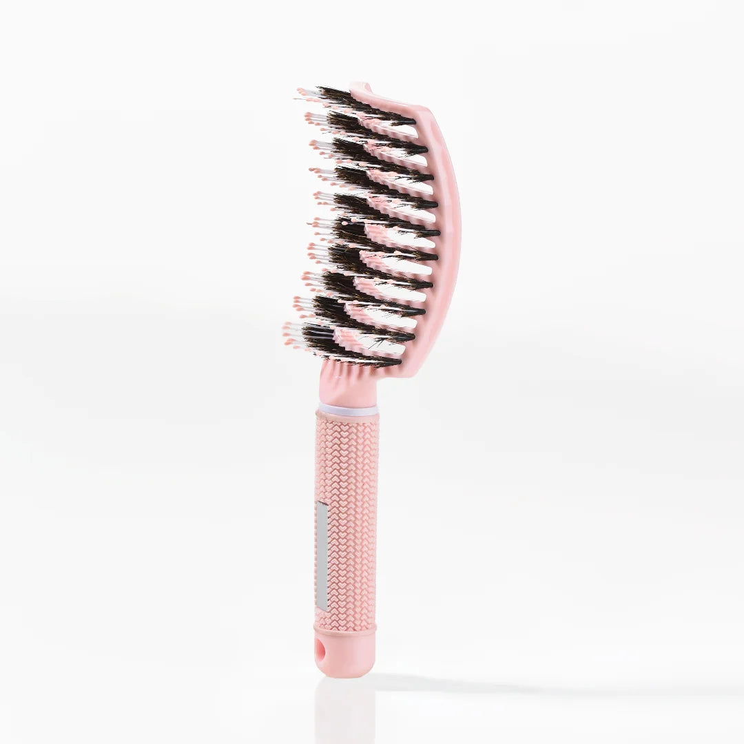 pink curved paddle brush