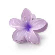 Hårklämma med blomma